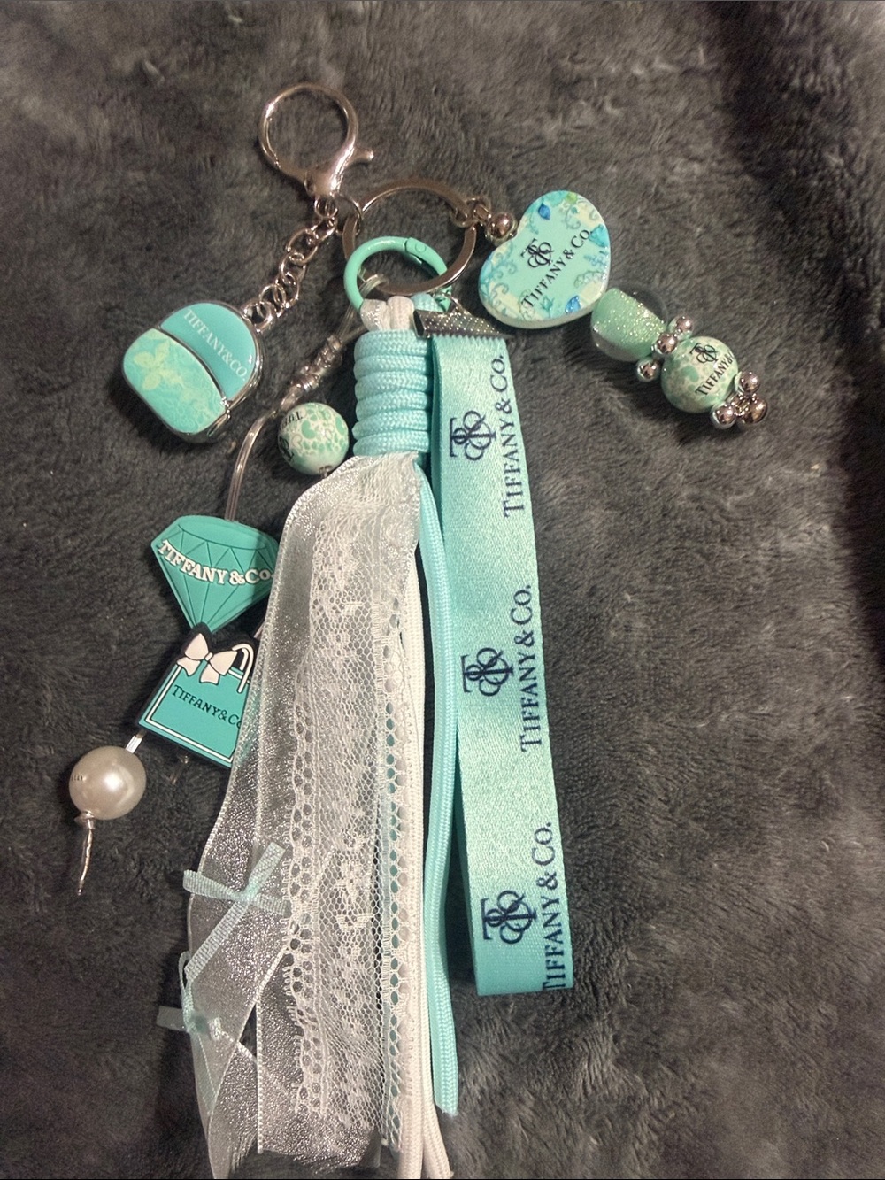 Teal and White Keychain Charm and tassels.